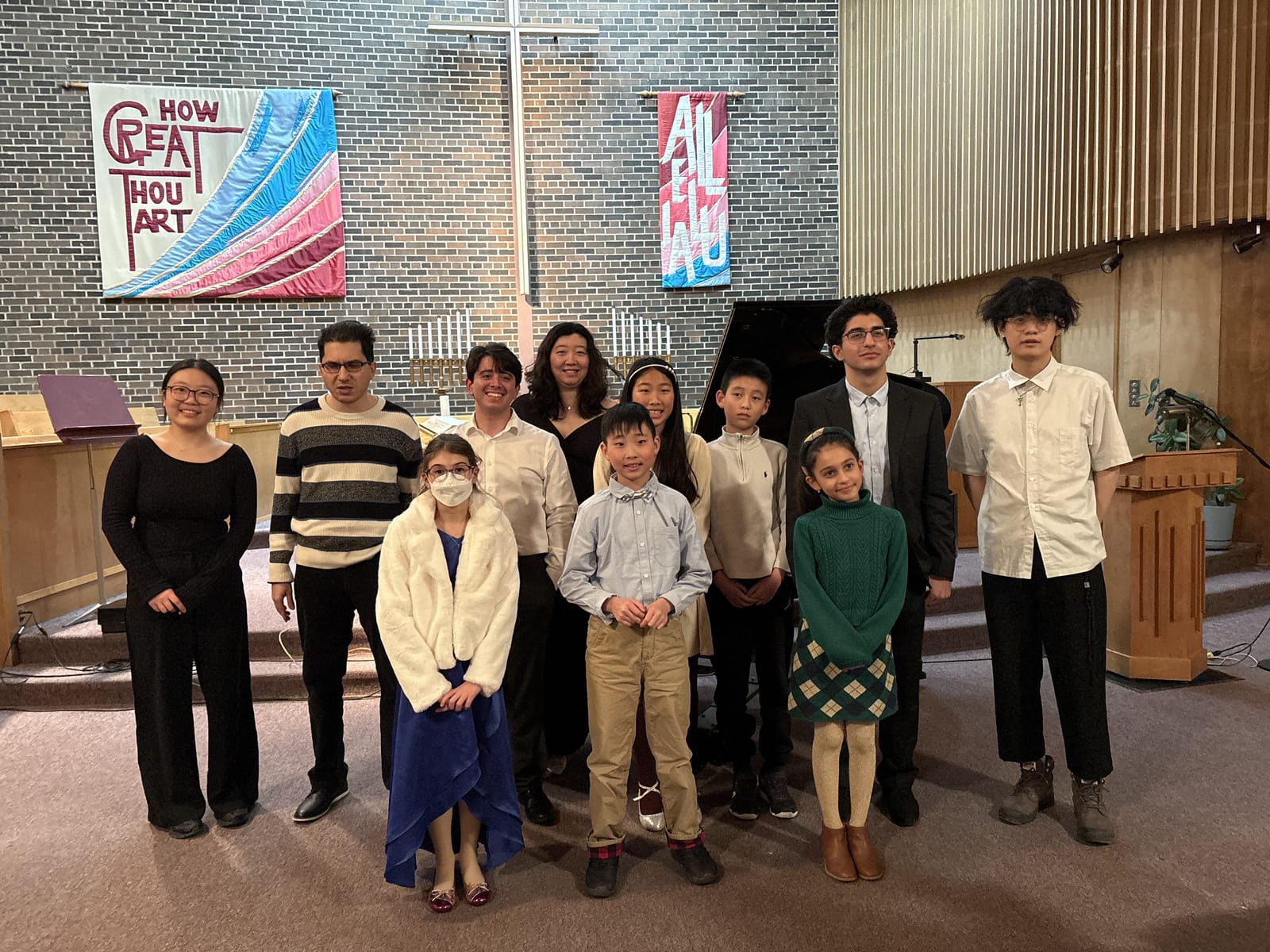 Students and teachers gathered on stage after the winter recital